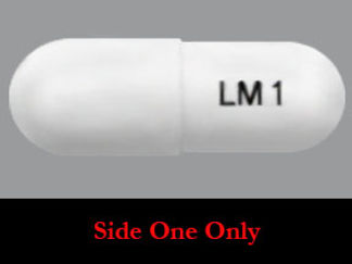 Esto es un Cápsula imprimido con LM1 en la parte delantera, nada en la parte posterior, y es fabricado por None.