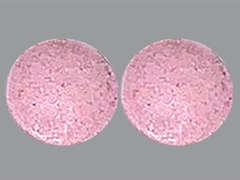This is a light pink round Tablet imprinted with nothing on the front, nothing on the back, and is manufactured by RUGBY.