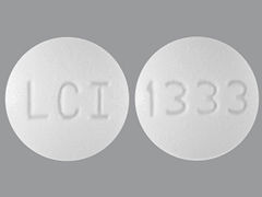 Esto es un Tableta blanco redondo imprimido con LCI en la parte delantera, 1333 en la parte posterior, y es fabricado por LANNETT CO. INC.