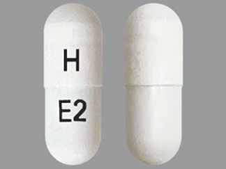 This is a Capsule Dr imprinted with H on the front, E2 on the back.