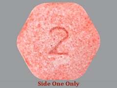 This is a light pink hexagonal Tablet Sublingual imprinted with 2 on the front, nothing on the back, and is manufactured by LANNETT CO. INC.