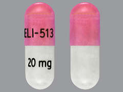 This is a white opaque oblong Capsule Er 24 Hr imprinted with ELI-513 on the front, 20 mg on the back, and is manufactured by ELITE LABORATOR.