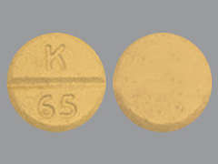 This is a peach round Tablet imprinted with K  65 on the front, nothing on the back, and is manufactured by KVK-TECH, INC..