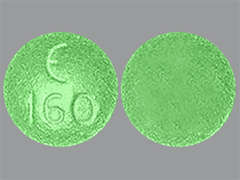 This is a green round Tablet imprinted with logo and 160 on the front, nothing on the back, and is manufactured by PURACAP LABORAT.