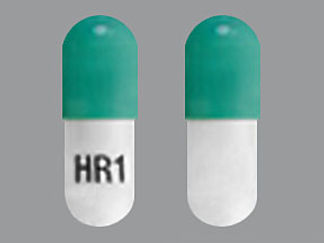 This is a Capsule Dr imprinted with HR1 on the front, nothing on the back.