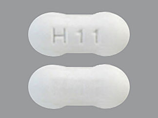 This is a Tablet imprinted with H11 on the front, nothing on the back.