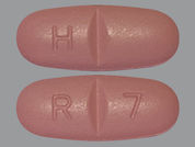 Rufinamide: This is a Tablet imprinted with H on the front, R 7 on the back.
