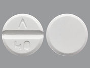 Primidone: This is a Tablet imprinted with logo and 40 on the front, nothing on the back.