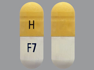 Esto es un Cápsula imprimido con H en la parte delantera, F7 en la parte posterior, y es fabricado por None.