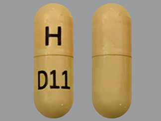 Esto es un Cápsula imprimido con H en la parte delantera, D11 en la parte posterior, y es fabricado por None.