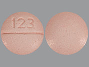 Carbidopa: This is a Tablet imprinted with 123 on the front, nothing on the back.