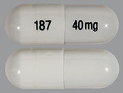 Esomeprazole Magnesium: This is a Capsule Dr imprinted with 187 on the front, 40 mg on the back.