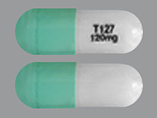 This is a Capsule Dr imprinted with T127 120 mg on the front, nothing on the back.