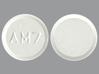 This is a Tablet imprinted with AM7 on the front, nothing on the back.