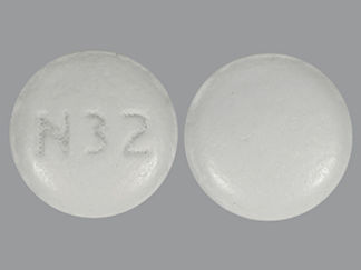 This is a Tablet Er imprinted with N 32 on the front, nothing on the back.