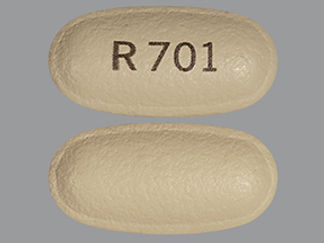 This is a Tablet Immediate D Release Biphase imprinted with R 701 on the front, nothing on the back.