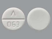 Lamotrigine: Esto es un Tableta blanquecine redondo imprimido con logo and 063 en la parte delantera, nada en la parte posterior, y es fabricado por ADVAGEN PHARMA.