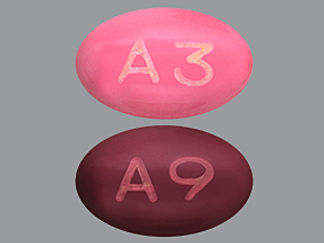 This is a Capsule imprinted with A3 or A9 on the front, nothing on the back.