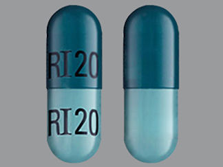 This is a Capsule Er 24 Hr imprinted with RI20 on the front, RI20 on the back.