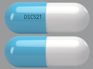 Esto es un Cápsula imprimido con DSC521 en la parte delantera, nada en la parte posterior, y es fabricado por None.