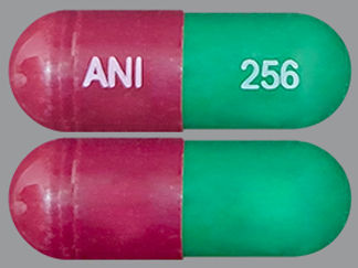 This is a Capsule imprinted with ANI on the front, 256 on the back.