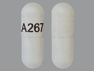 This is a Capsule imprinted with LA267 on the front, nothing on the back.