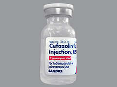 This is a white Vial imprinted with nothing on the front, nothing on the back, and is manufactured by SANDOZ.