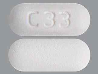 This is a Tablet imprinted with C33 on the front, nothing on the back.