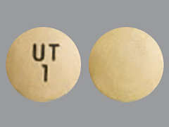This is a yellow round Tablet Er imprinted with UT  1 on the front, nothing on the back, and is manufactured by UNITED THERAP.