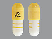 Fingolimod: Esto es un Cápsula imprimido con FO  0.5 mg en la parte delantera, nada en la parte posterior, y es fabricado por None.