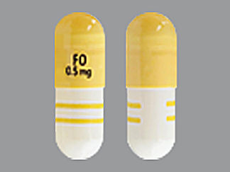 Esto es un Cápsula imprimido con FO  0.5 mg en la parte delantera, nada en la parte posterior, y es fabricado por None.