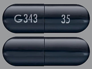 Esto es un Cápsula imprimido con G 343 en la parte delantera, 35 en la parte posterior, y es fabricado por None.