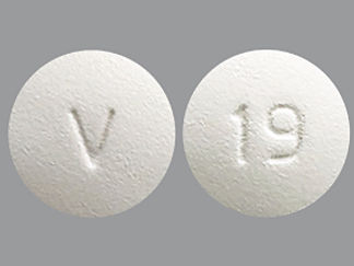 This is a Tablet imprinted with V on the front, 19 on the back.