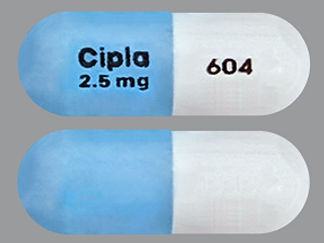 This is a Capsule imprinted with Cipla  2.5 mg on the front, 604 on the back.