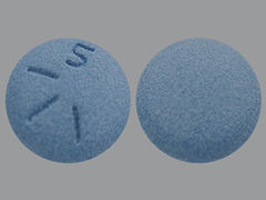 This is a blue round Tablet imprinted with 1115 on the front, nothing on the back, and is manufactured by ZYDUS PHARMACEU.