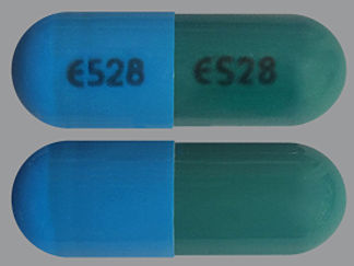 This is a Capsule imprinted with E528 on the front, E528 on the back.