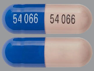 This is a Capsule imprinted with 54 066 on the front, 54 066 on the back.