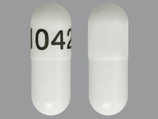 This is a Capsule Sprinkle Er 24 Hr imprinted with 1042 on the front, nothing on the back.