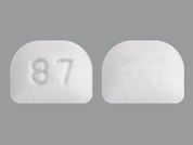 Acid Reducer: This is a Tablet imprinted with 87 on the front, nothing on the back.