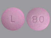 Nebivolol Hcl: This is a pink round Tablet imprinted with L on the front, 80 on the back, and is manufactured by AUROBINDO PHARM.