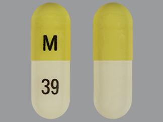 This is a Capsule imprinted with M on the front, 39 on the back.