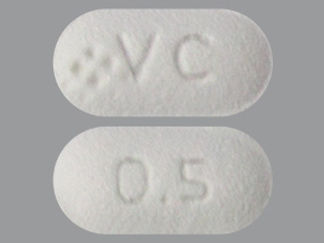 This is a Tablet imprinted with logo and VC on the front, 0.5 on the back.