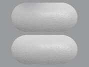Oyster Shell Calcium: Esto es un Tableta blanco oval imprimido con nada en la parte delantera, nada en la parte posterior, y es fabricado por RUGBY.