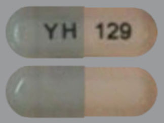 This is a Capsule Er 24 Hr imprinted with YH on the front, 129 on the back.