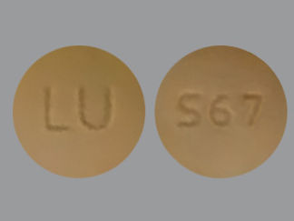 Esto es un Tableta Er 24 Hr imprimido con LU en la parte delantera, S67 en la parte posterior, y es fabricado por None.