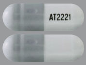 Opfolda: This is a Capsule imprinted with AT2221 on the front, nothing on the back.