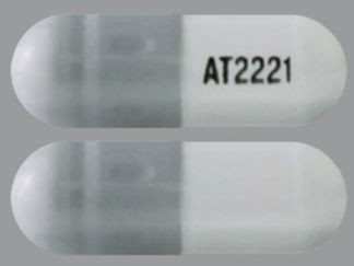This is a Capsule imprinted with AT2221 on the front, nothing on the back.