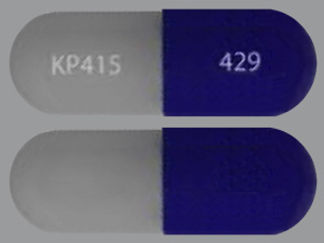 This is a Capsule imprinted with 429 on the front, KP415 on the back.