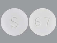 This is a white round Tablet imprinted with S on the front, 6 7 on the back, and is manufactured by SOLCO HEALTHCAR.