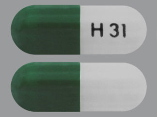 Esto es un Cápsula Er Multifásico 24hr imprimido con H 31 en la parte delantera, nada en la parte posterior, y es fabricado por None.